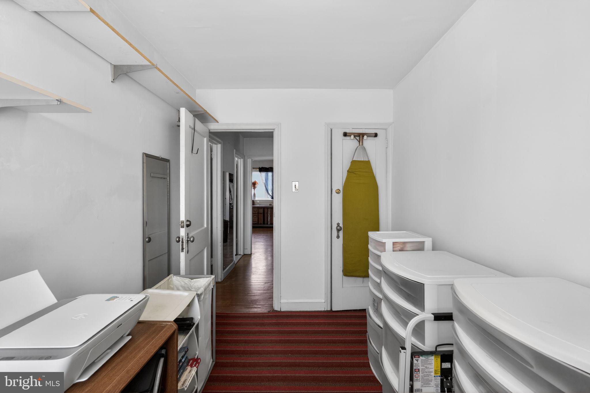 8238 Forrest Avenue Philadelphia, PA 19150 - Photo 23 of 29 a living room with a bed and furniture