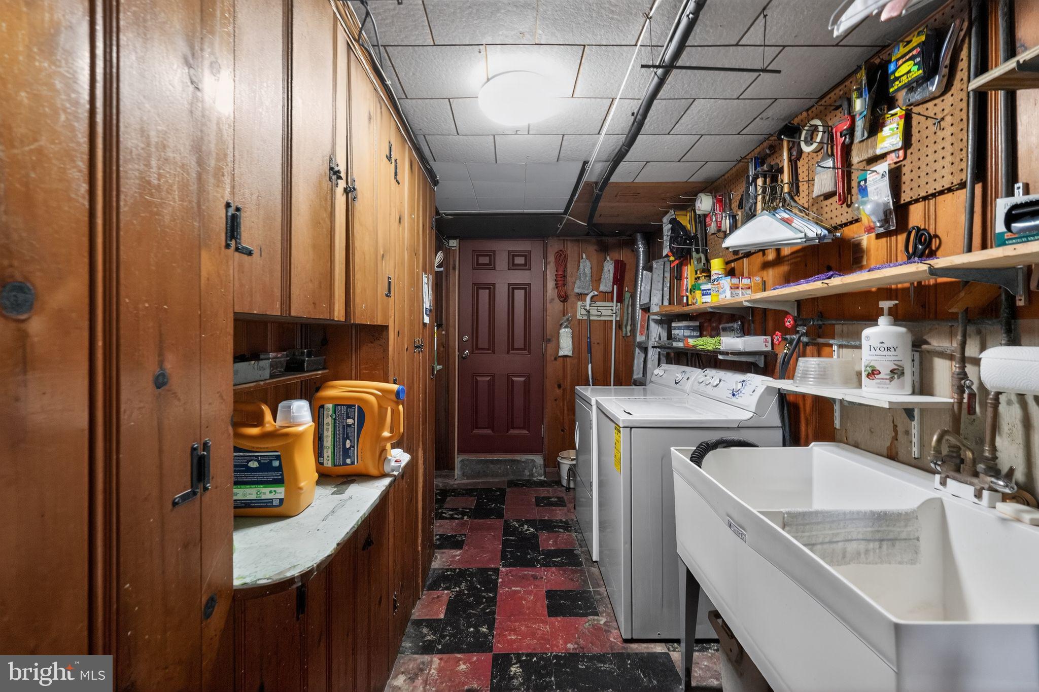 8238 Forrest Avenue Philadelphia, PA 19150 - Photo 25 of 29 a storage room with washer and dryer