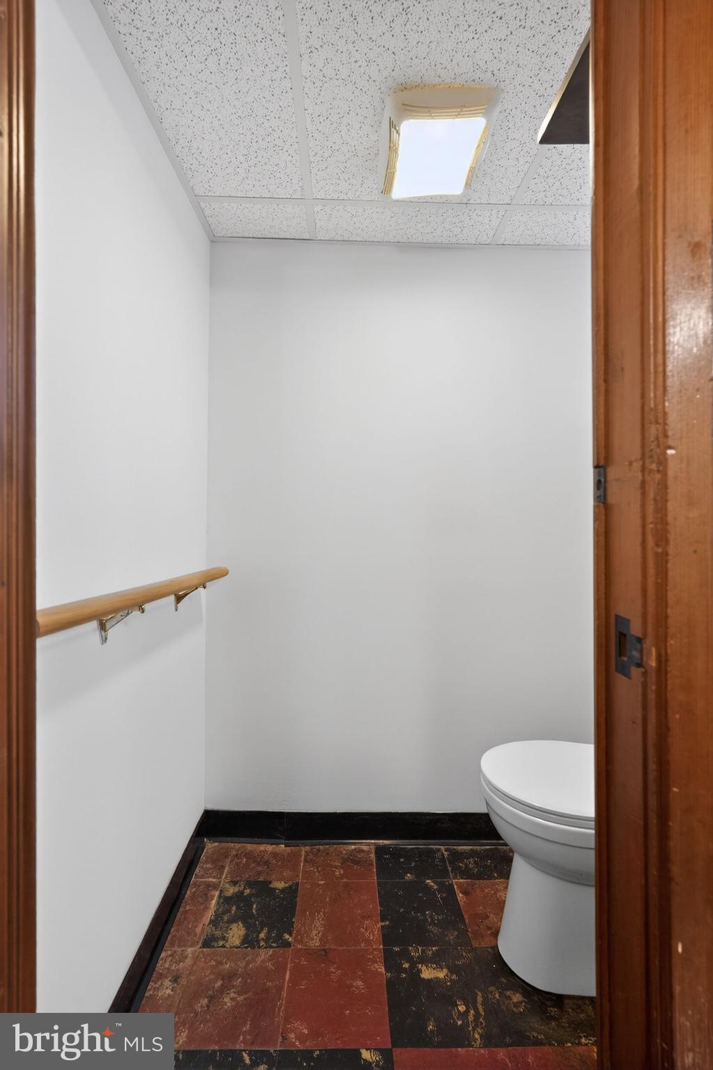 8238 Forrest Avenue Philadelphia, PA 19150 - Photo 28 of 29 a bathroom with a toilet and a shower