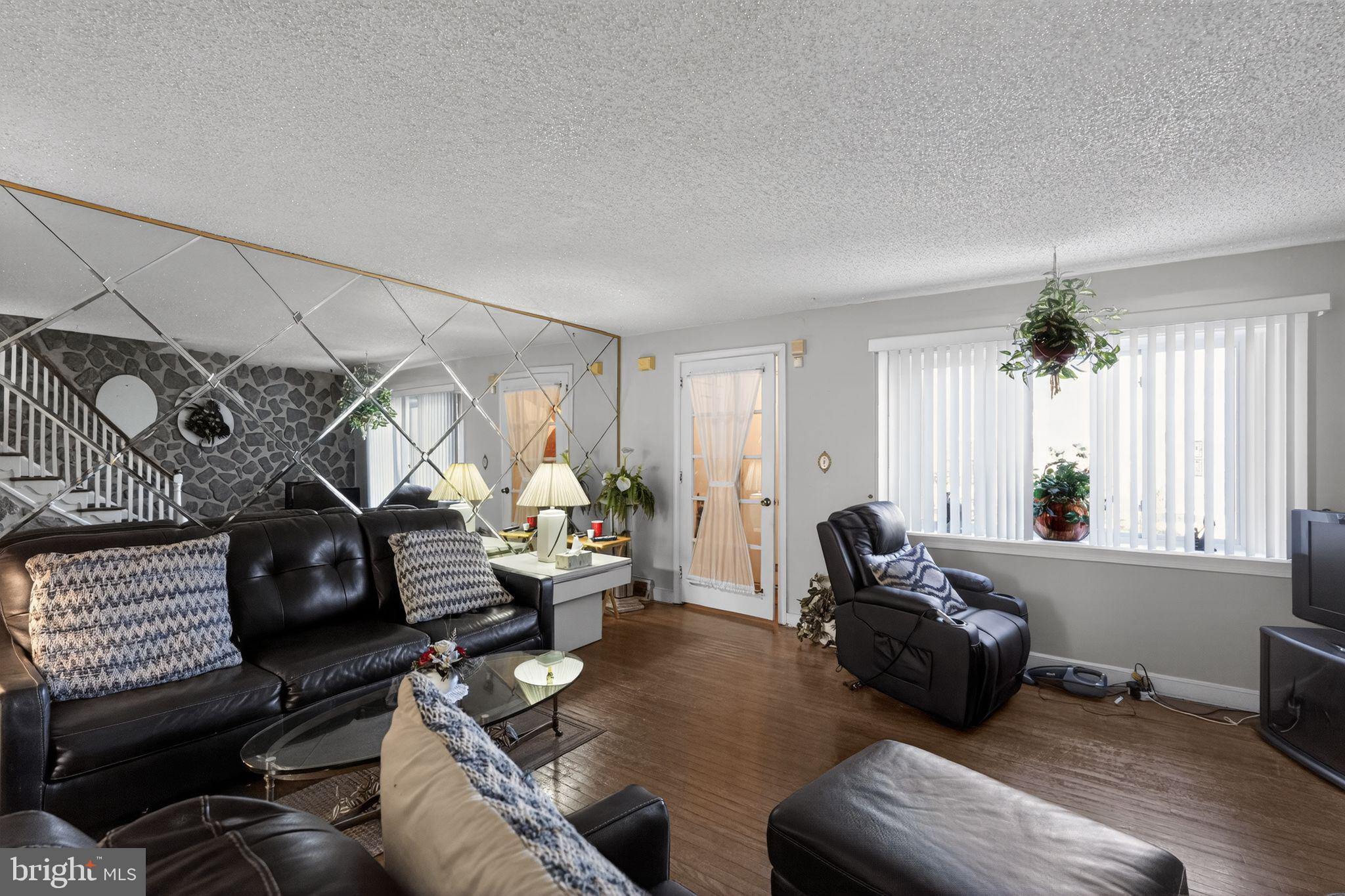 8238 Forrest Avenue Philadelphia, PA 19150 - Photo 4 of 29 a living room with furniture and a window