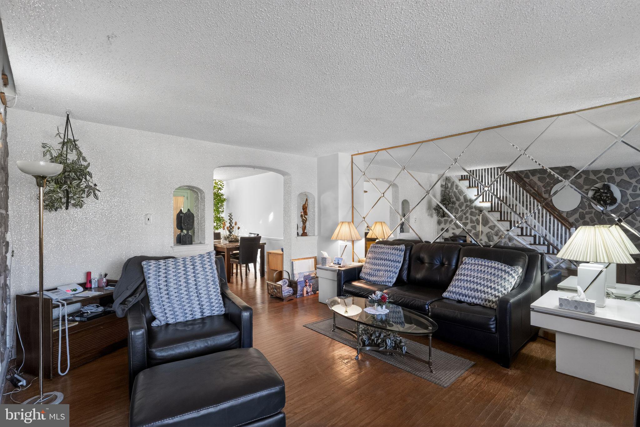 8238 Forrest Avenue Philadelphia, PA 19150 - Photo 5 of 29 a living room with furniture and wooden floor