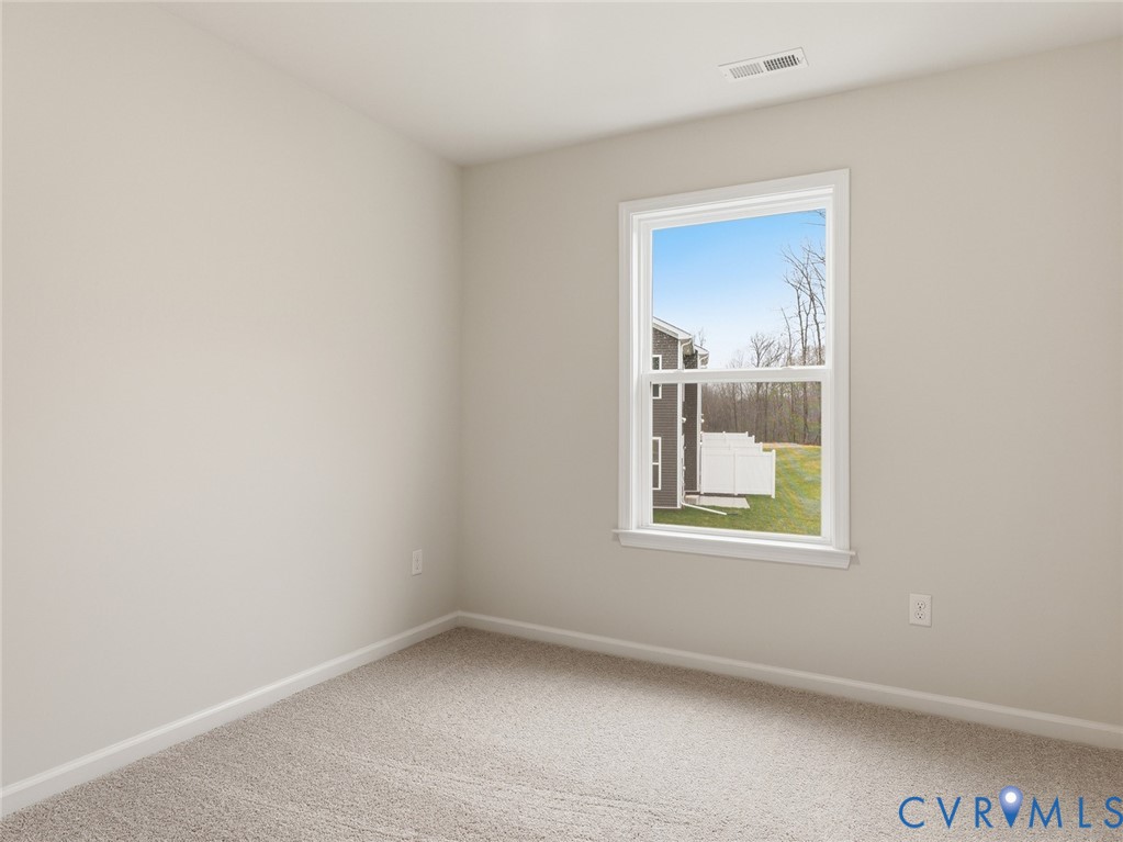161 Corcoran Way Aylett, VA 23009 - Photo 14 of 21 an empty room with a window