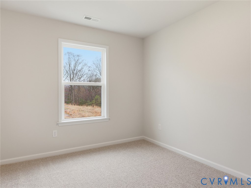 161 Corcoran Way Aylett, VA 23009 - Photo 15 of 21 an empty room with a window