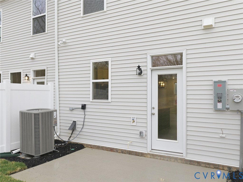 161 Corcoran Way Aylett, VA 23009 - Photo 18 of 21 a view of a brick house with a window