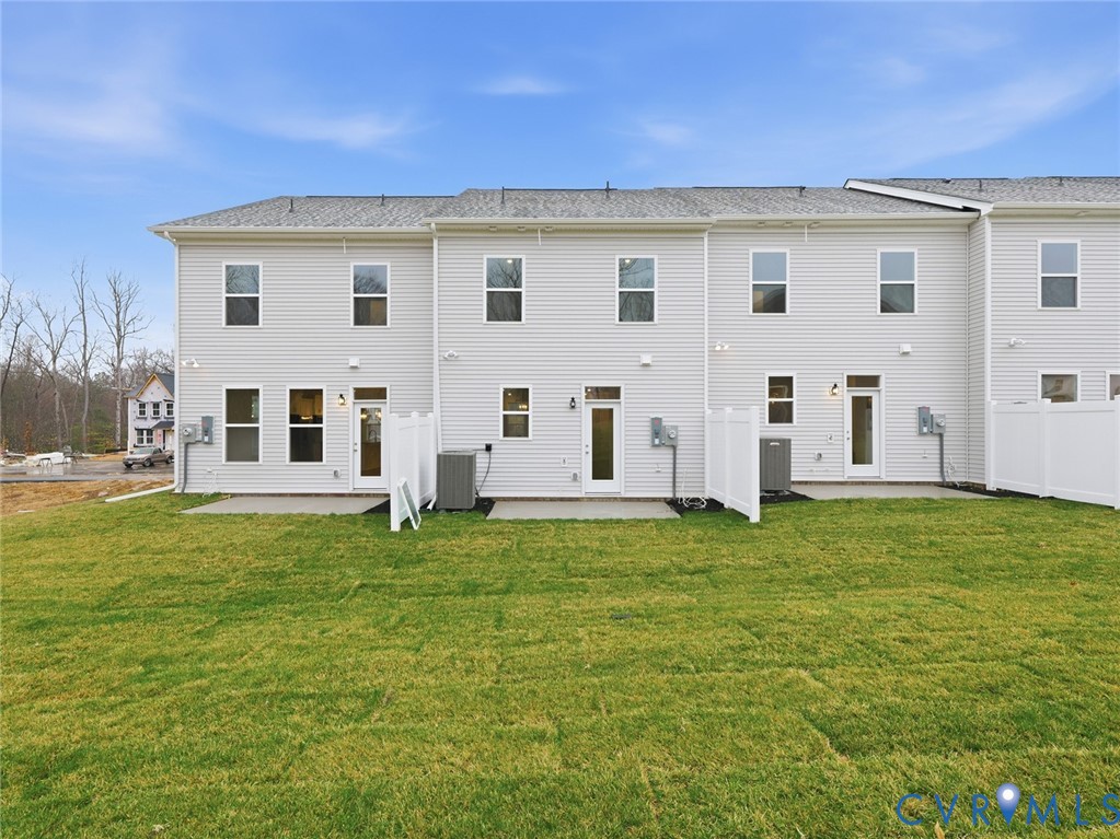161 Corcoran Way Aylett, VA 23009 - Photo 19 of 21 a view of a house with a backyard