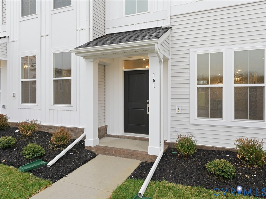 161 Corcoran Way Aylett, VA 23009 - Photo 21 of 21 a front view of a house with a yard