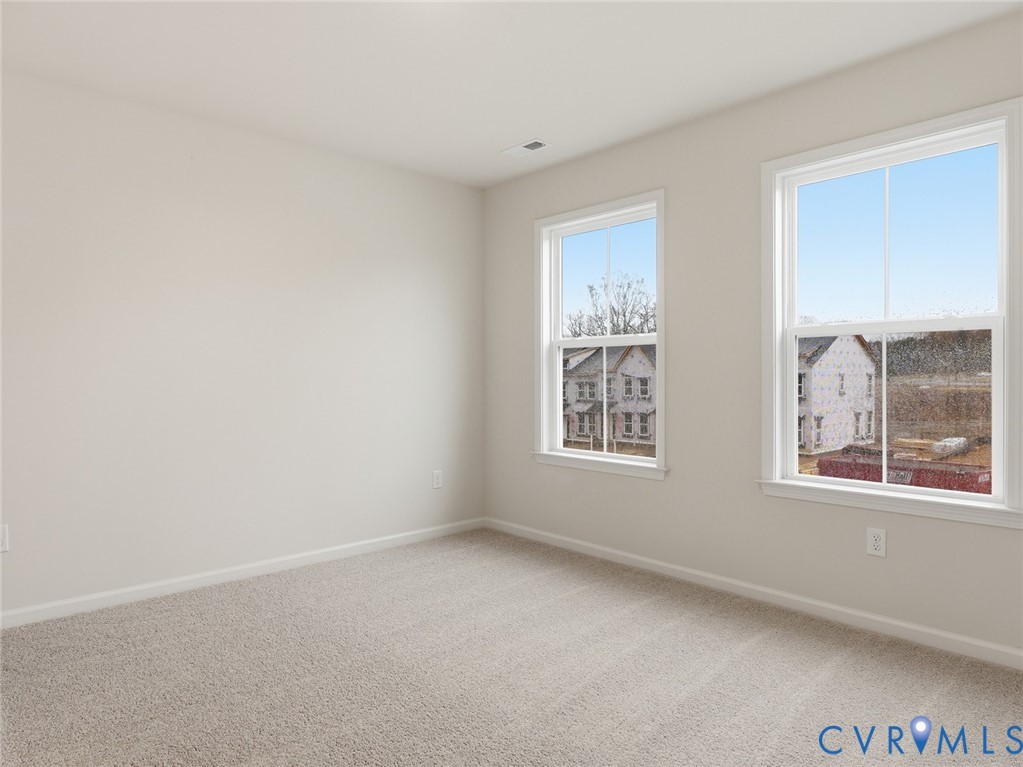 161 Corcoran Way Aylett, VA 23009 - Photo 10 of 21 an empty room with windows