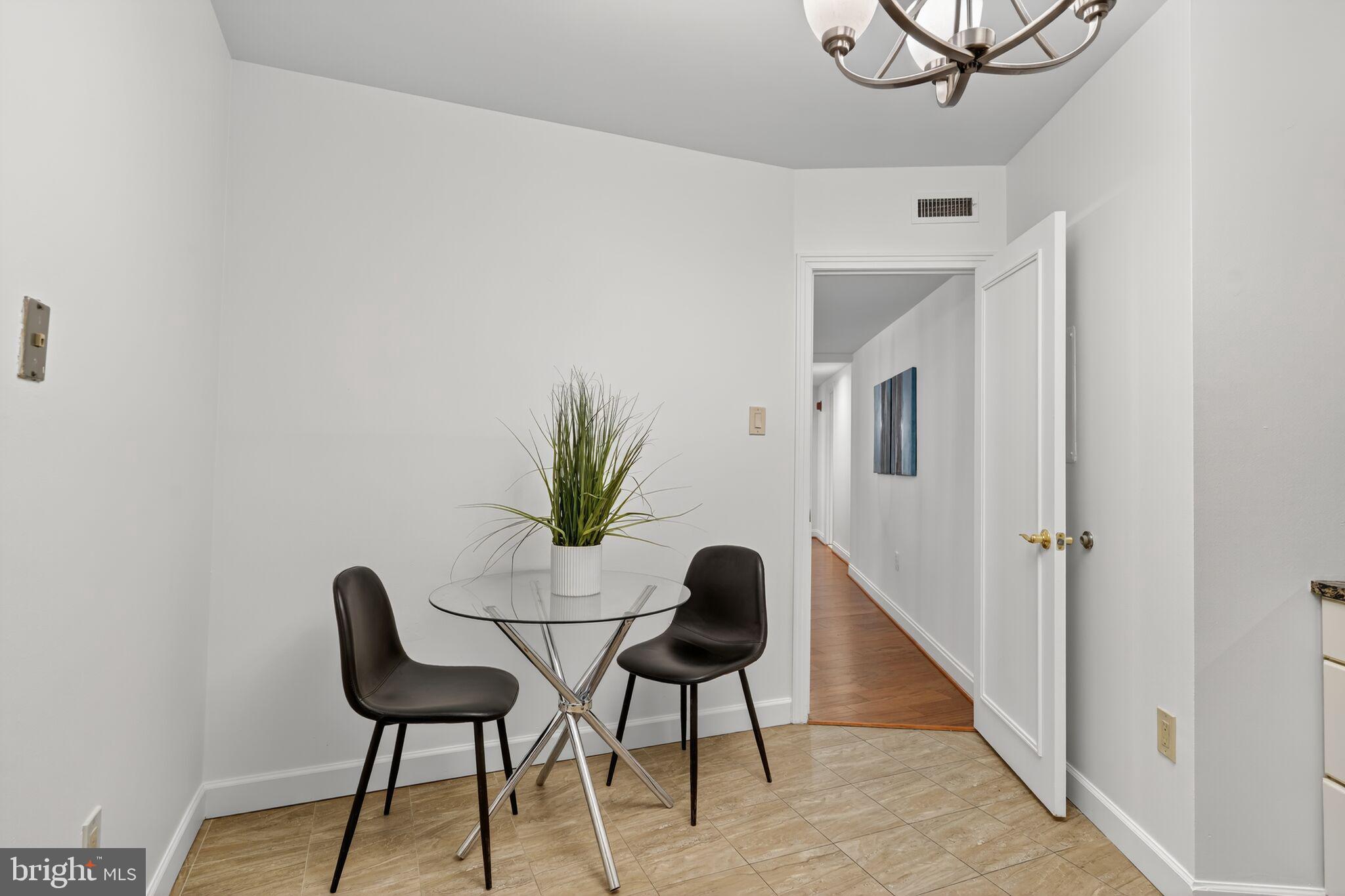 4550 North Park Avenue, Unit 814 Chevy Chase, MD 20815 - Photo 11 of 25 a workspace room with furniture and wooden floor