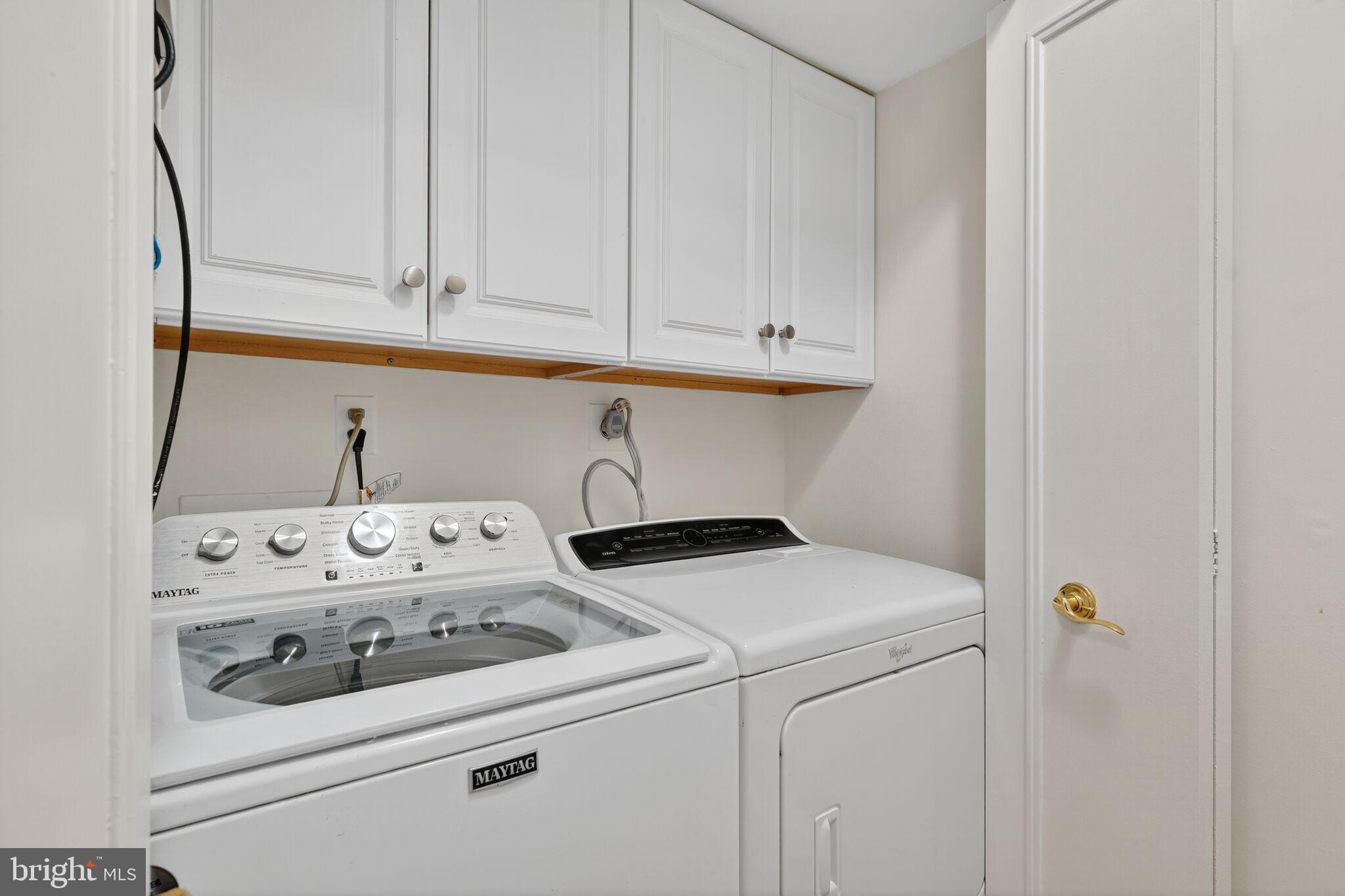 4550 North Park Avenue, Unit 814 Chevy Chase, MD 20815 - Photo 17 of 25 a utility room with dryer and washer