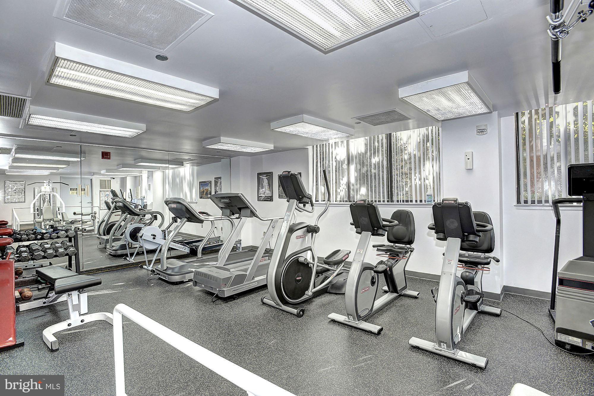 4550 North Park Avenue, Unit 814 Chevy Chase, MD 20815 - Photo 22 of 25 a view of a room with gym equipment