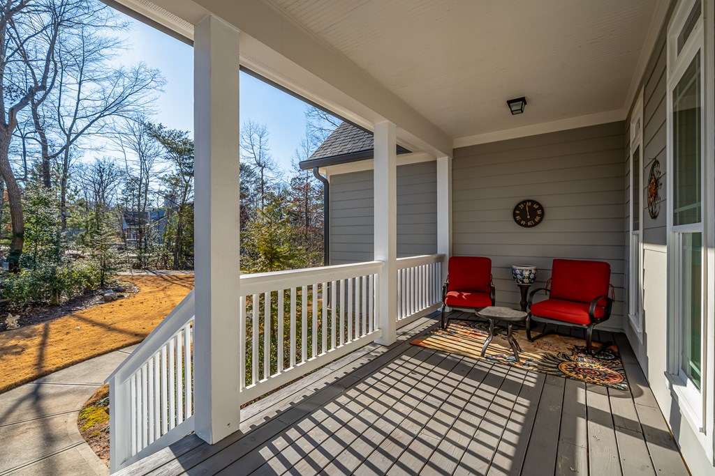 96 Morgan Trail Ellijay, GA 30536 - Photo 17 of 48 a view of a balcony with chair and wooden floor