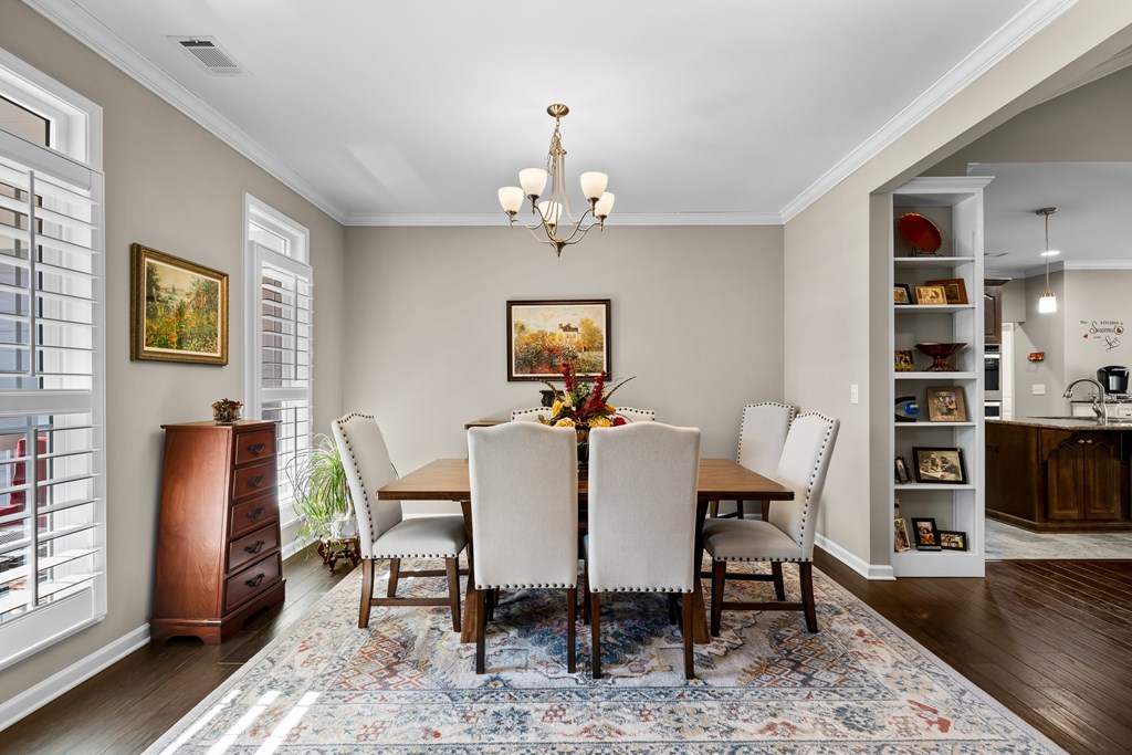 96 Morgan Trail Ellijay, GA 30536 - Photo 19 of 48 a view of a dining room with furniture wooden floor and a chandelier
