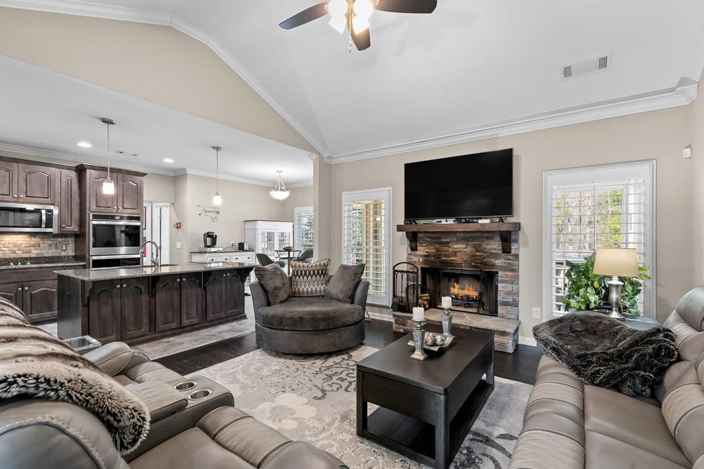 96 Morgan Trail Ellijay, GA 30536 - Photo 23 of 48 a living room with furniture a flat screen tv and a fireplace