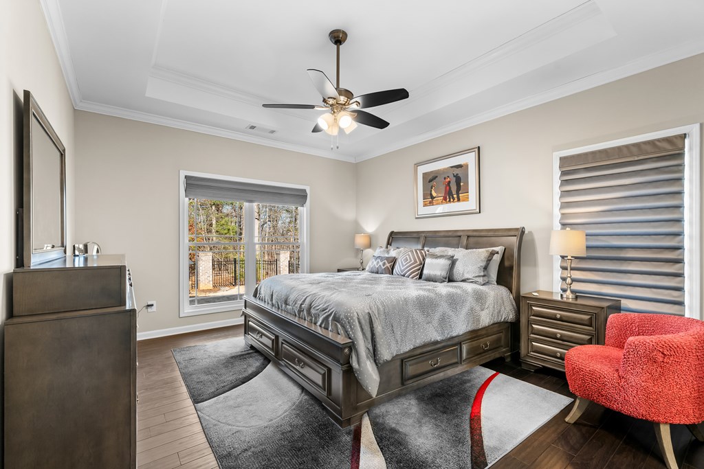 96 Morgan Trail Ellijay, GA 30536 - Photo 34 of 48 a bedroom with a bed and wooden floor