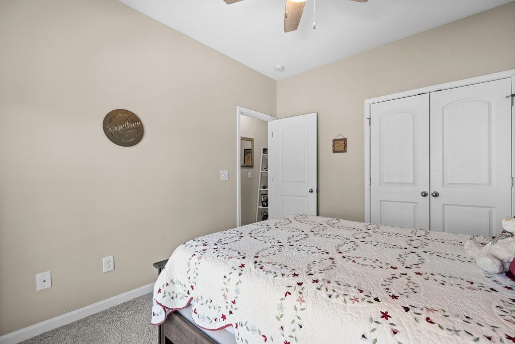 96 Morgan Trail Ellijay, GA 30536 - Photo 41 of 48 a bedroom with a bed and a window