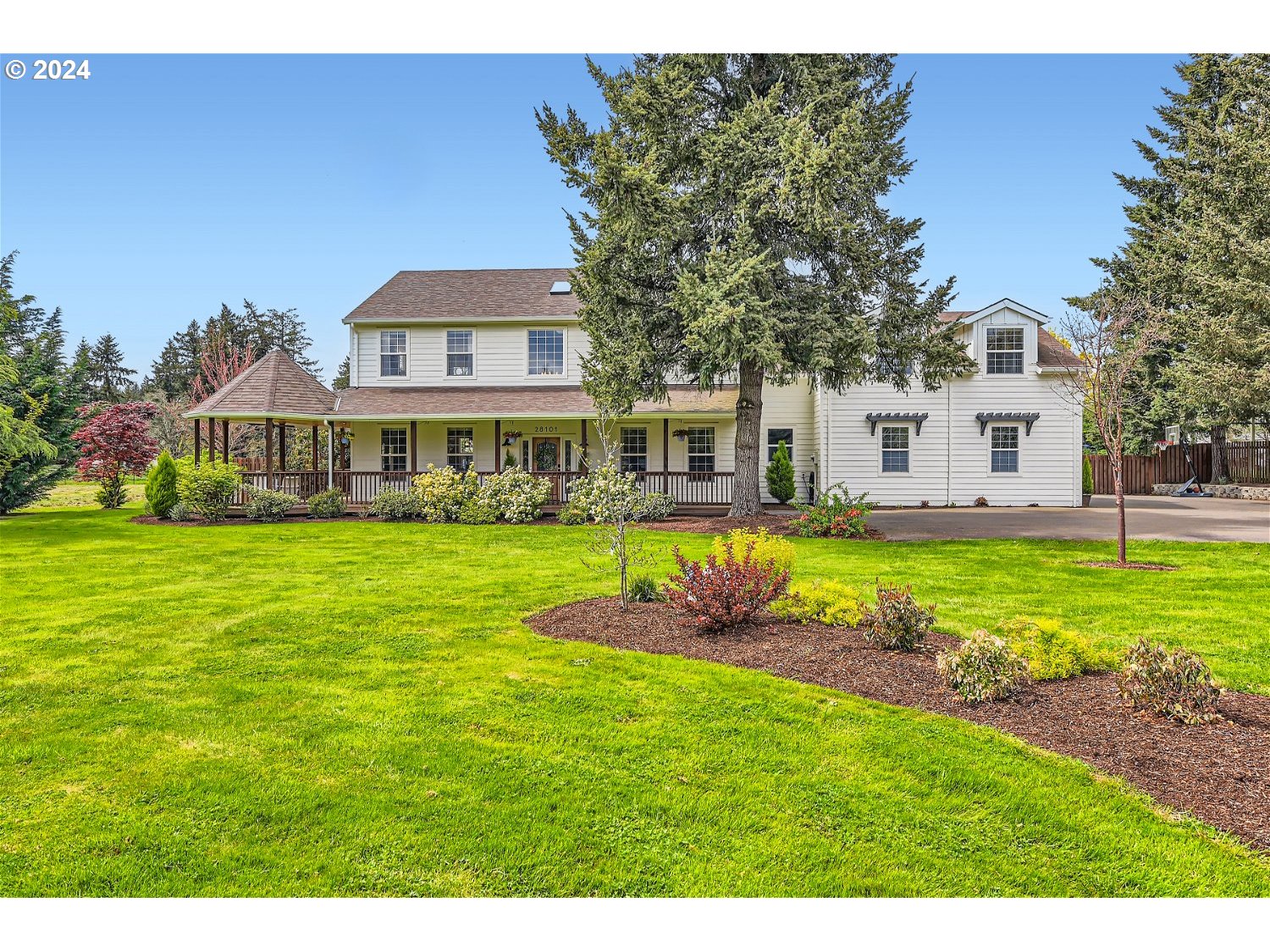 28101 Southwest Grahams Ferry Road Wilsonville, OR 97070 - Photo 3 of 40 a view of a house with a big yard