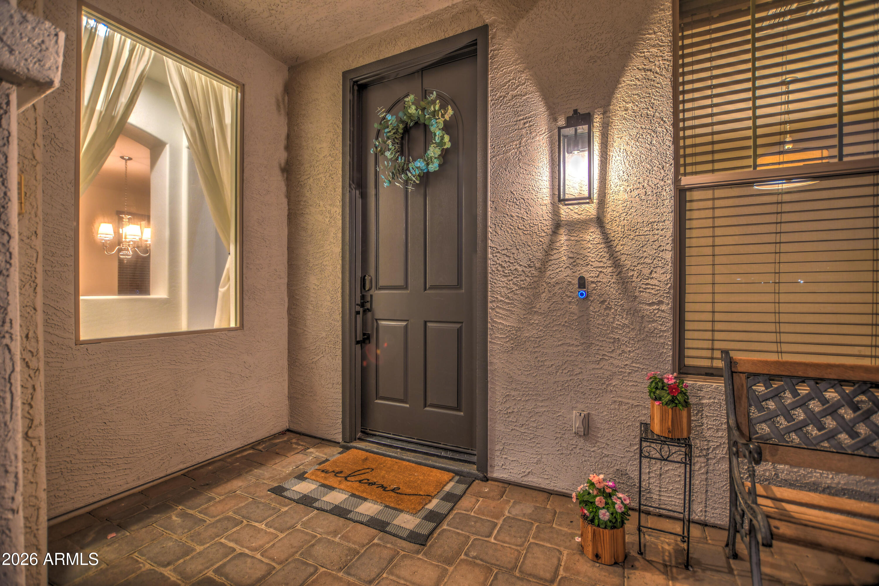 3078 East Muirfield Street Gilbert, AZ 85298 - Photo 12 of 92 a view of an entryway door front of a house