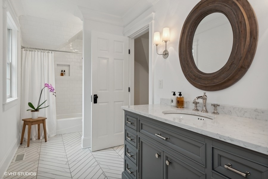 383 West County Line Road Barrington Hills, IL 60010 - Photo 45 of 75 a bathroom with a sink and a mirror