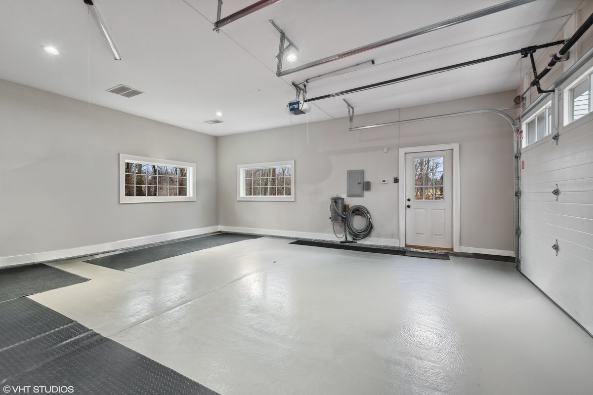 383 West County Line Road Barrington Hills, IL 60010 - Photo 63 of 75 a view of a big room with wooden floor and windows