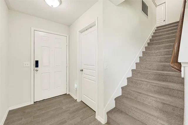 a view of an entryway with stairs