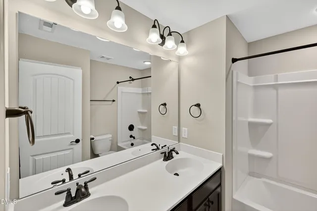 a view of a balcony with wooden floor