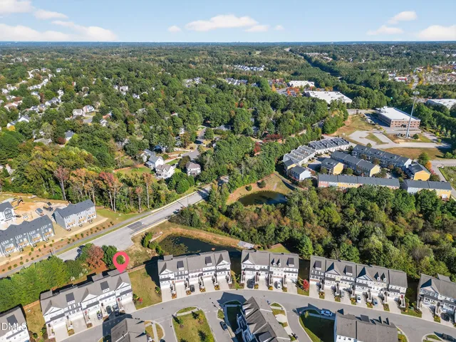 an aerial view of residential house with parking space