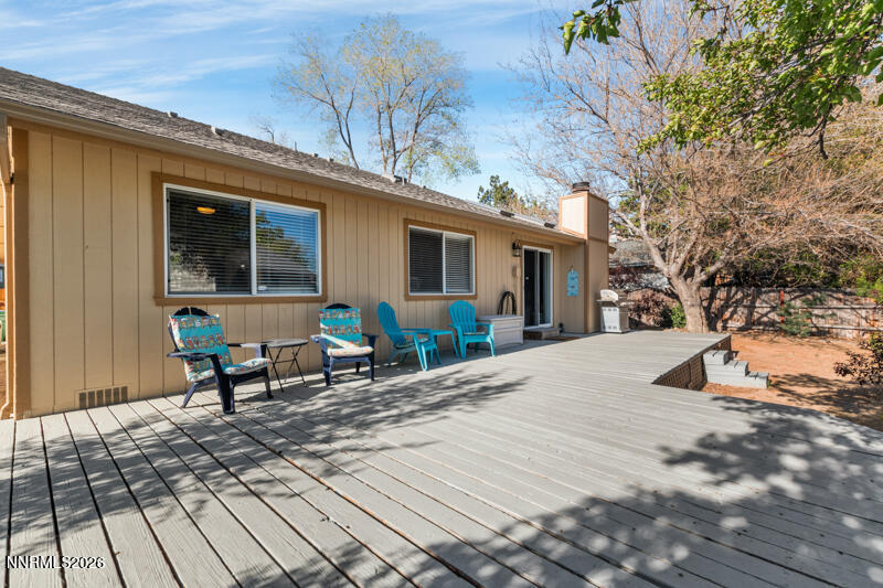 675 College Drive Reno, NV 89503 - Photo 27 of 30 a bench sitting in front of a house