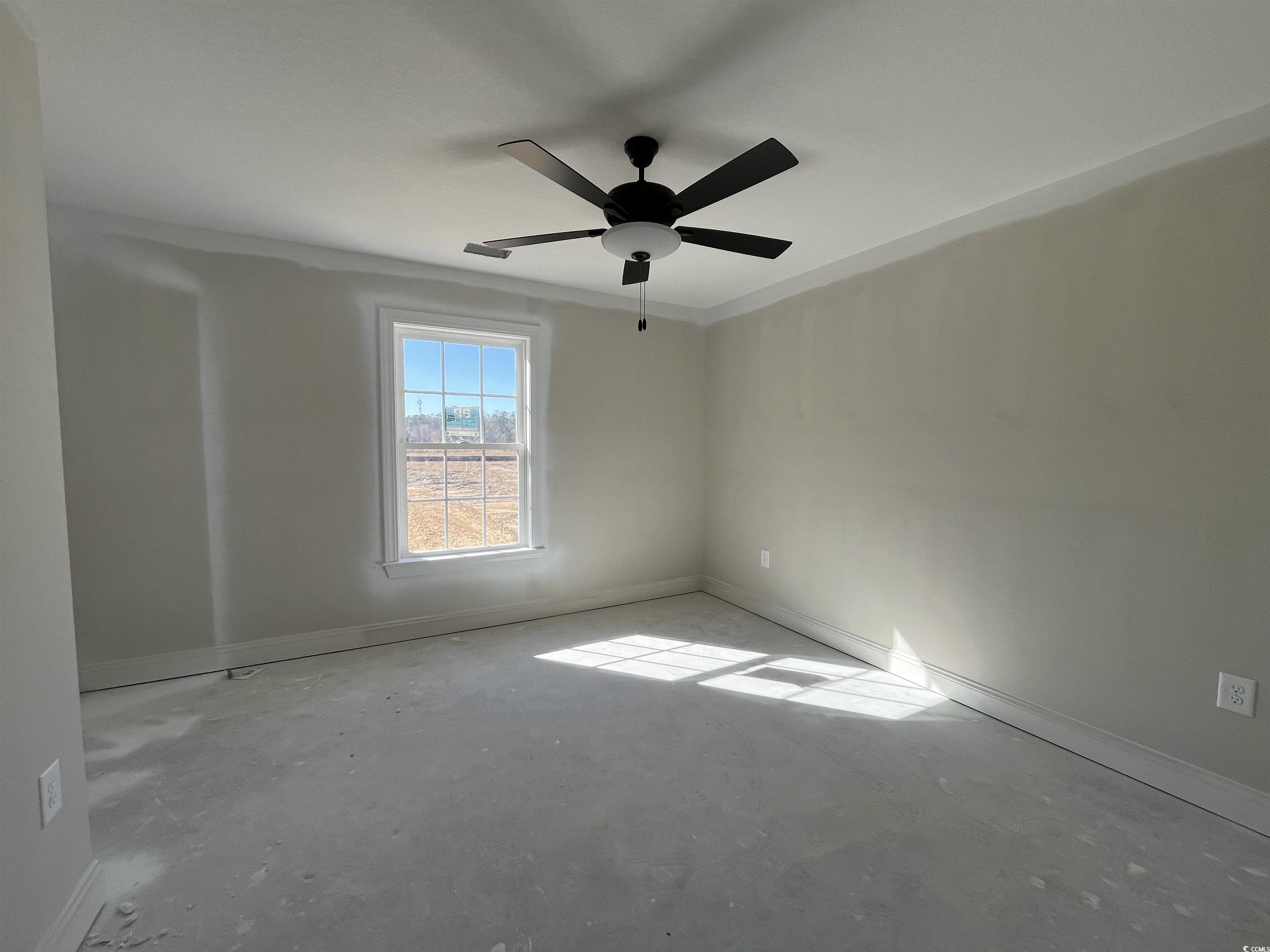 8187 Kerl Road Aynor, SC 29511 - Photo 11 of 14 Spare room with ceiling fan