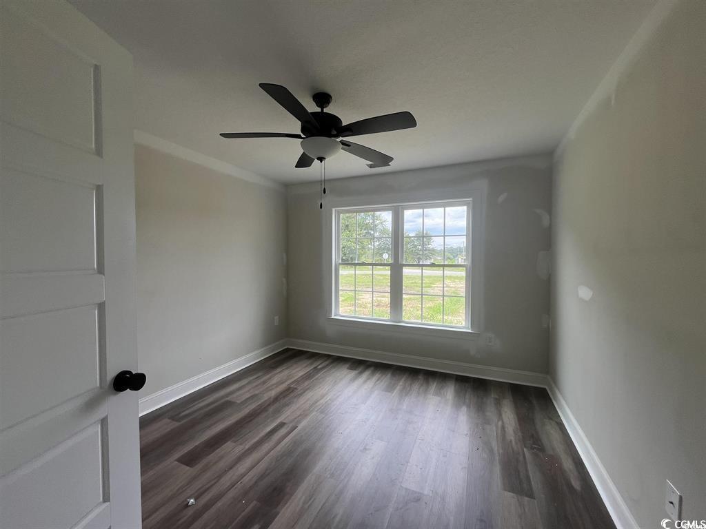 8187 Kerl Road Aynor, SC 29511 - Photo 9 of 14 Spare room with dark wood-type flooring, ceiling f