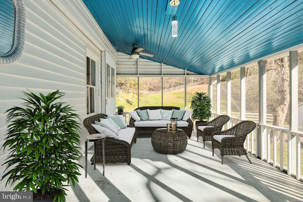 496 Frenchman Pond Road Fort Valley, VA 22652 - Photo 8 of 77 Large screened porch off of the kitchen