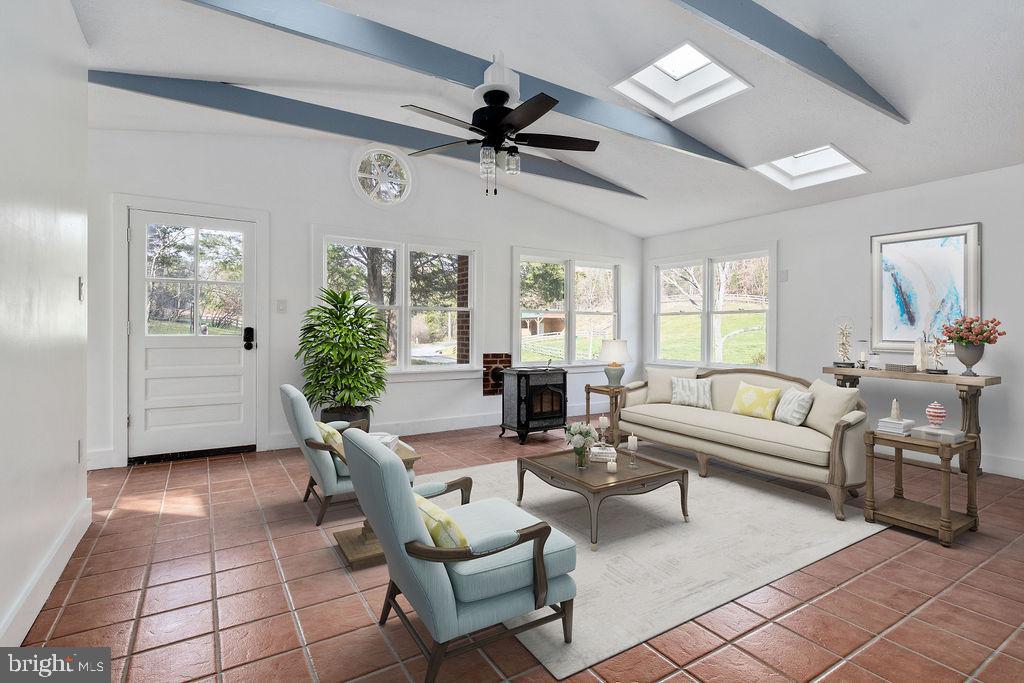 496 Frenchman Pond Road Fort Valley, VA 22652 - Photo 10 of 77 Bright and sunny family room