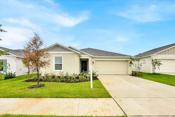 a front view of house with yard