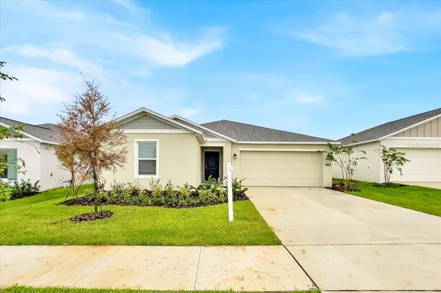 a front view of house with yard