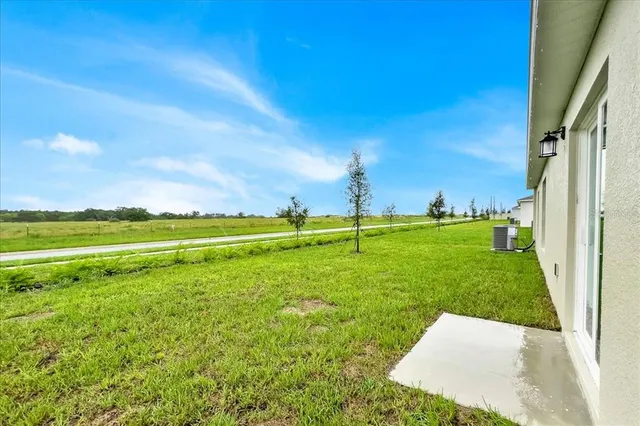 a view of a golf course with a lake