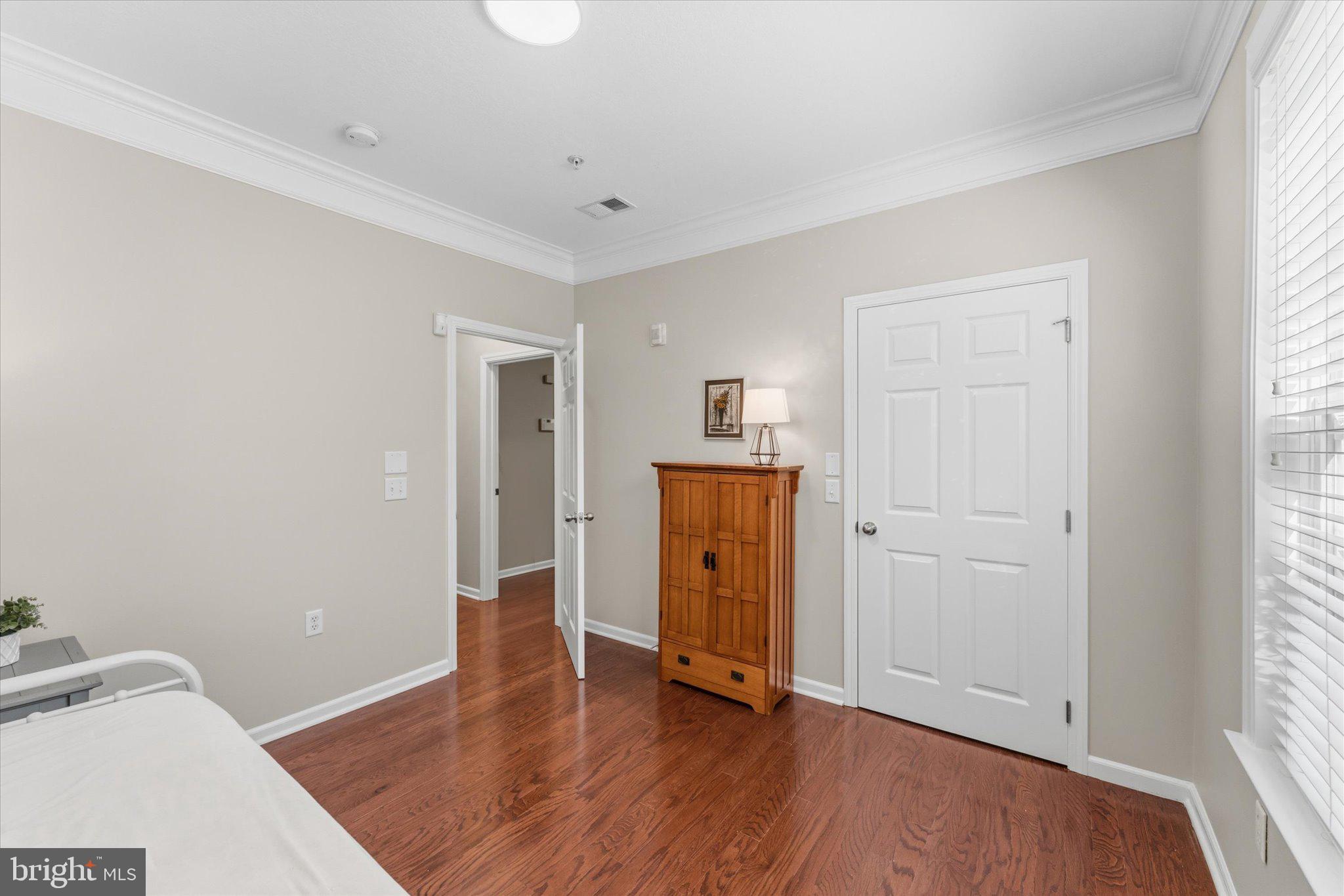 503 Sunset View Terrace Southeast, Unit 101 Leesburg, VA 20175 - Photo 27 of 39 Bright and inviting bedroom retreat.