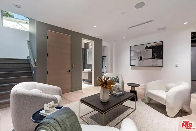 a outdoor living space with furniture and a potted plant