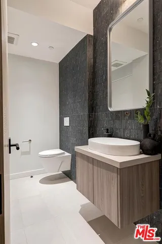 a view of a patio with couches table and chairs