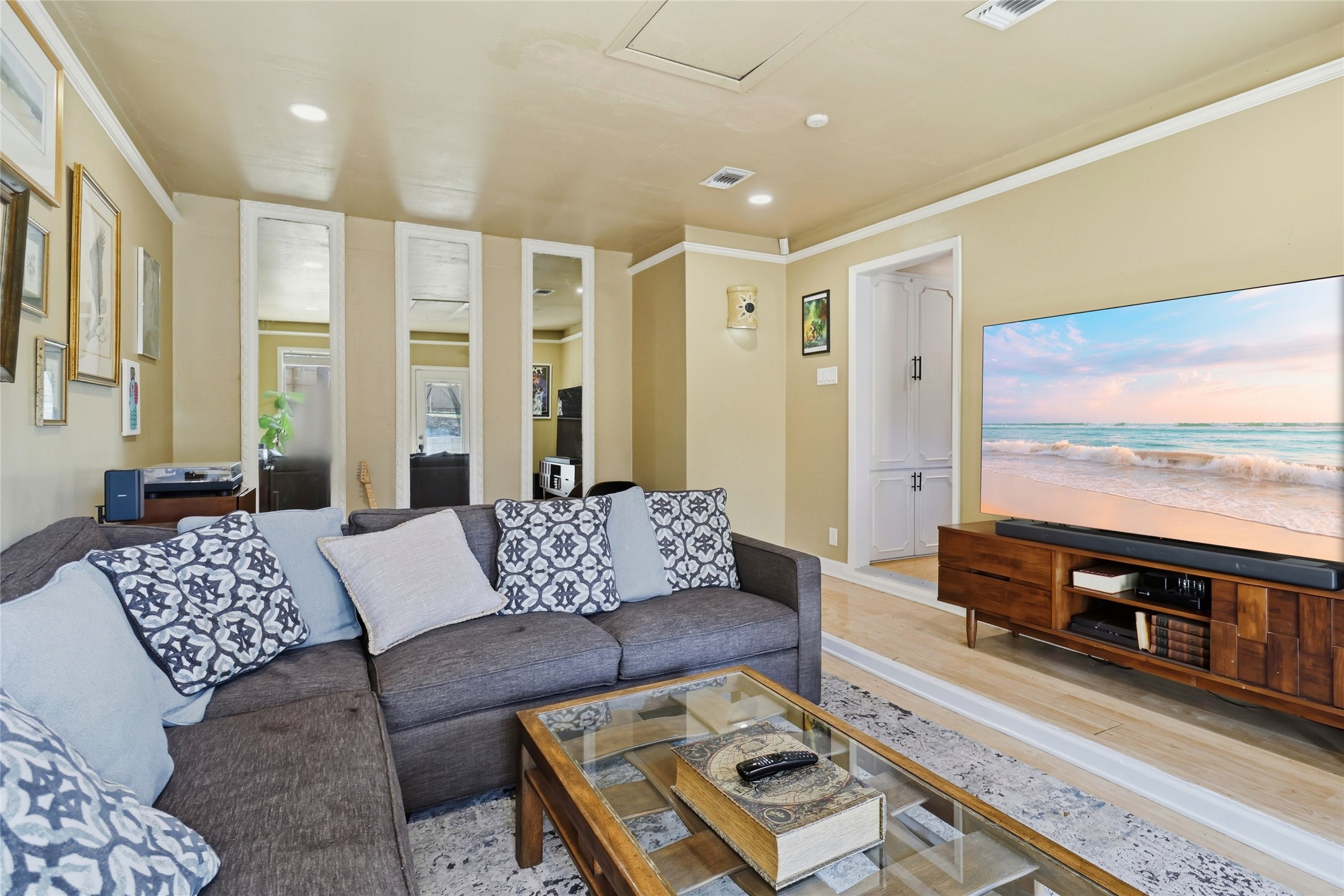 505 Lightsey Road Austin, TX 78704 - Photo 11 of 36 a living room with furniture and a floor to ceiling window