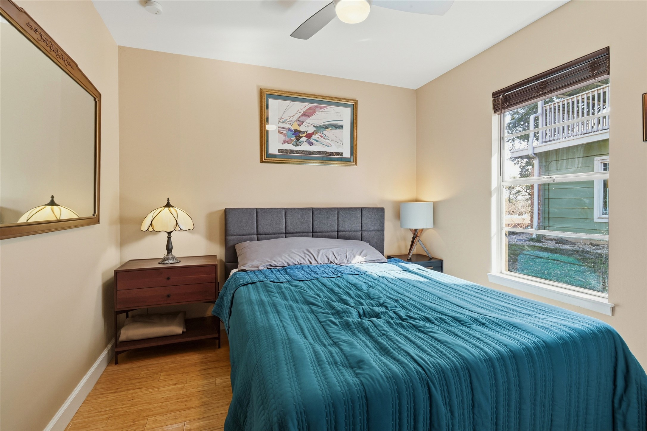 505 Lightsey Road Austin, TX 78704 - Photo 18 of 36 Bedroom with wood finished floors and ceiling fan