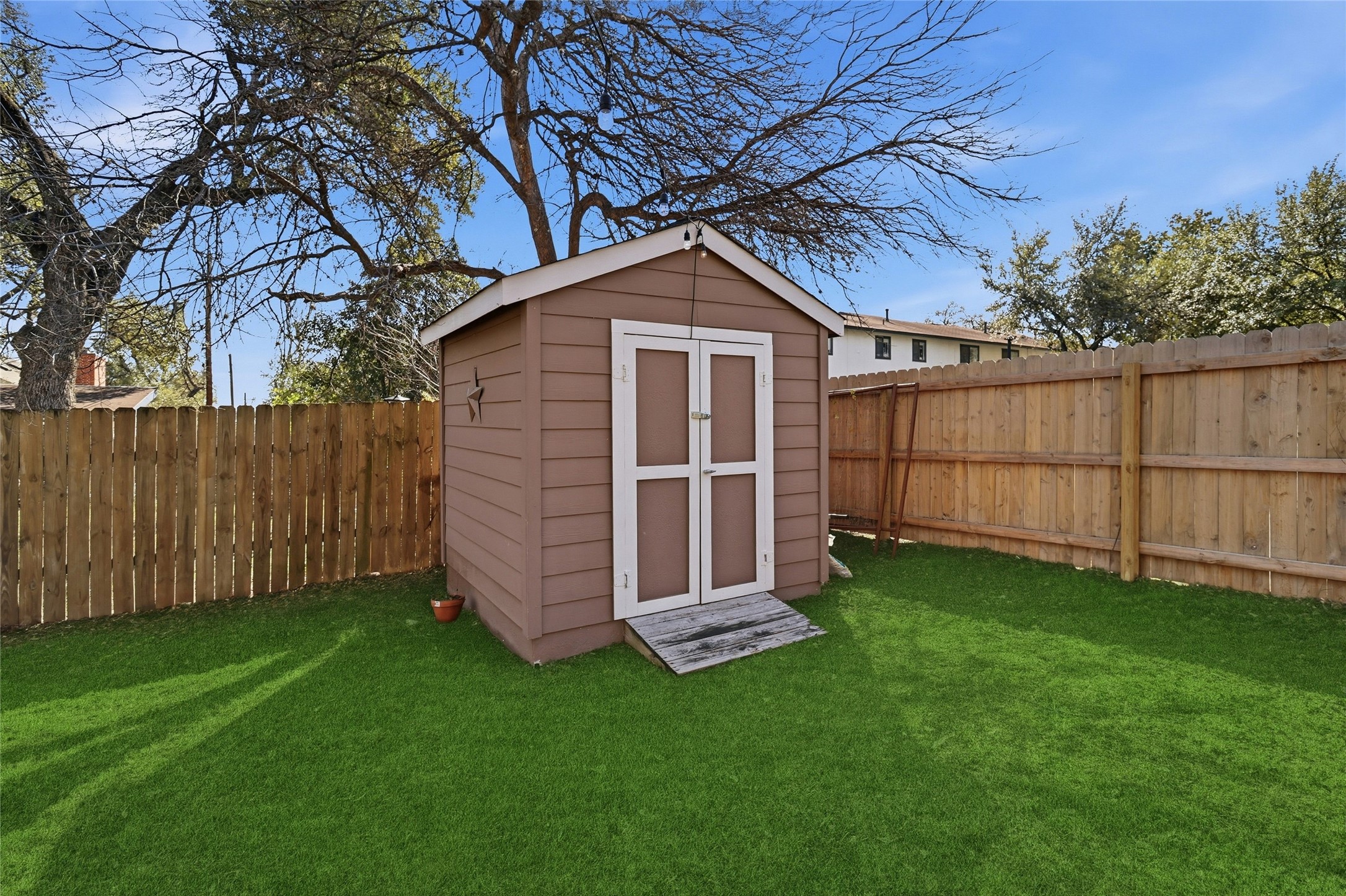 505 Lightsey Road Austin, TX 78704 - Photo 27 of 36 View of shed featuring a fenced backyard