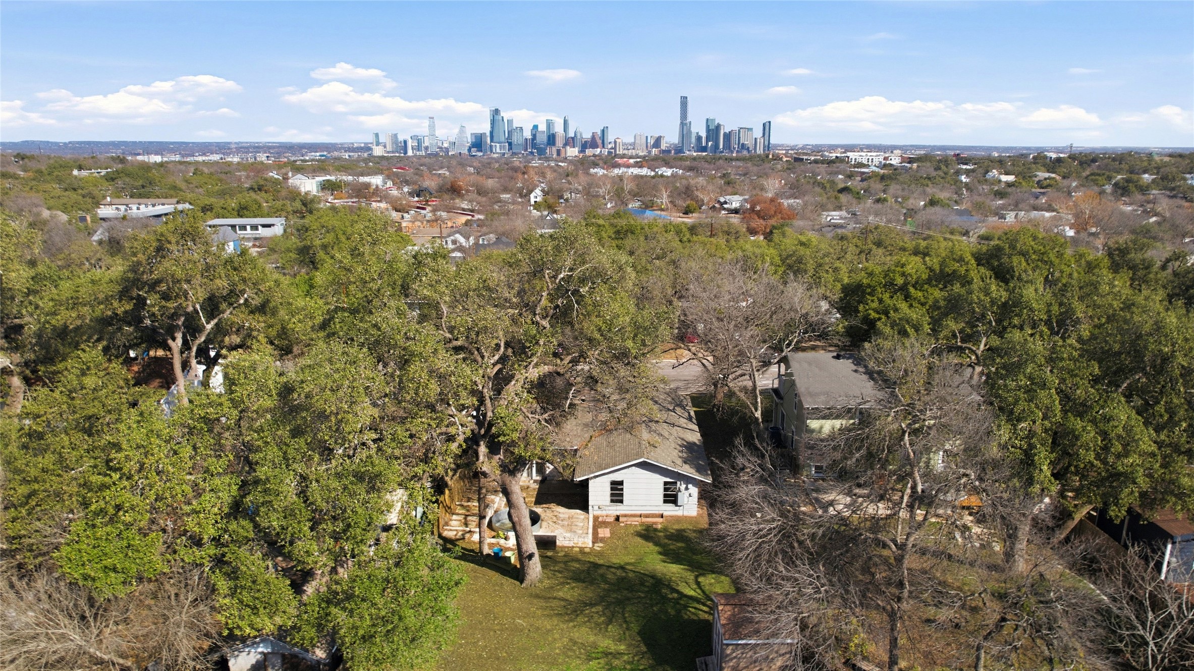 505 Lightsey Road Austin, TX 78704 - Photo 3 of 36 Bird's eye view of skyline and a tree filled landscape