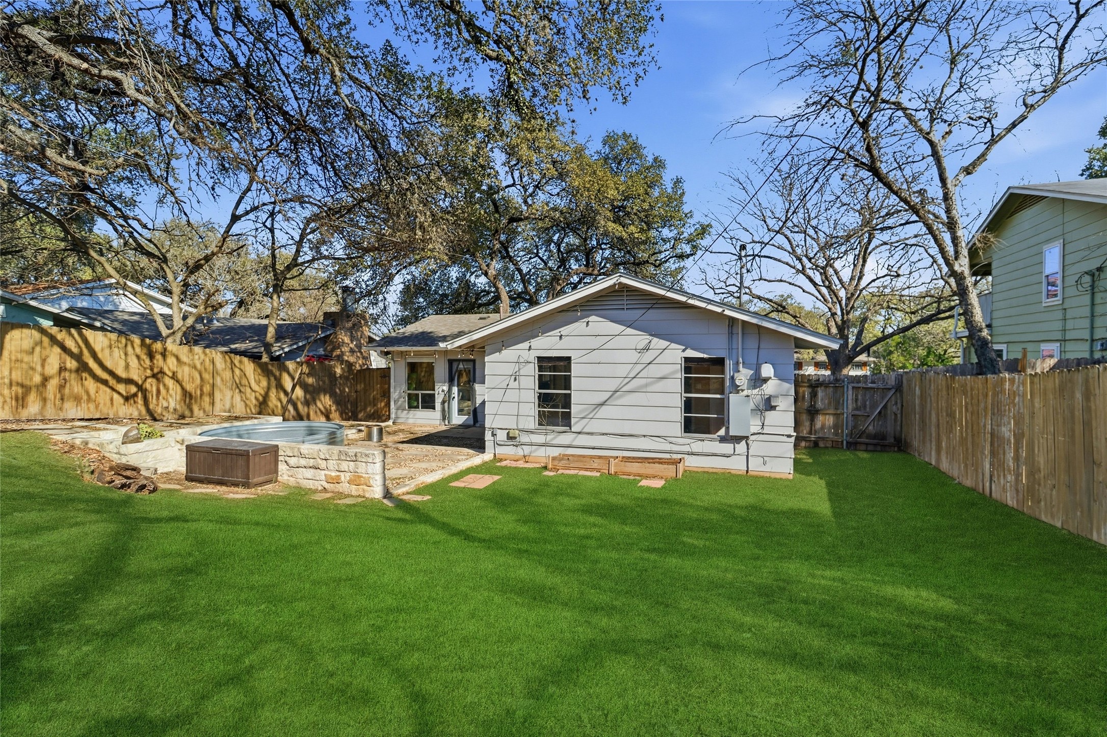 505 Lightsey Road Austin, TX 78704 - Photo 9 of 36 a front view of a house with garden