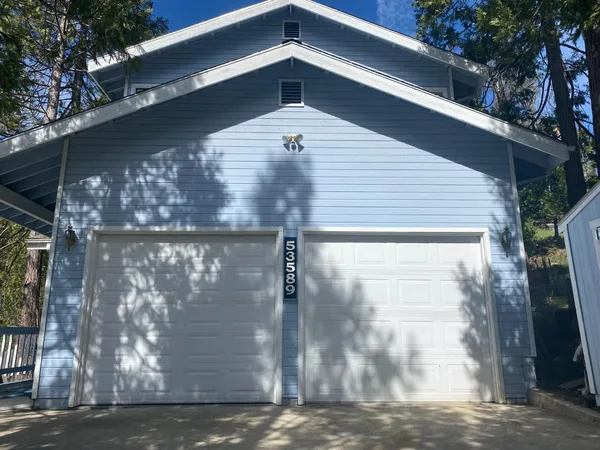 a view of a porch and garden