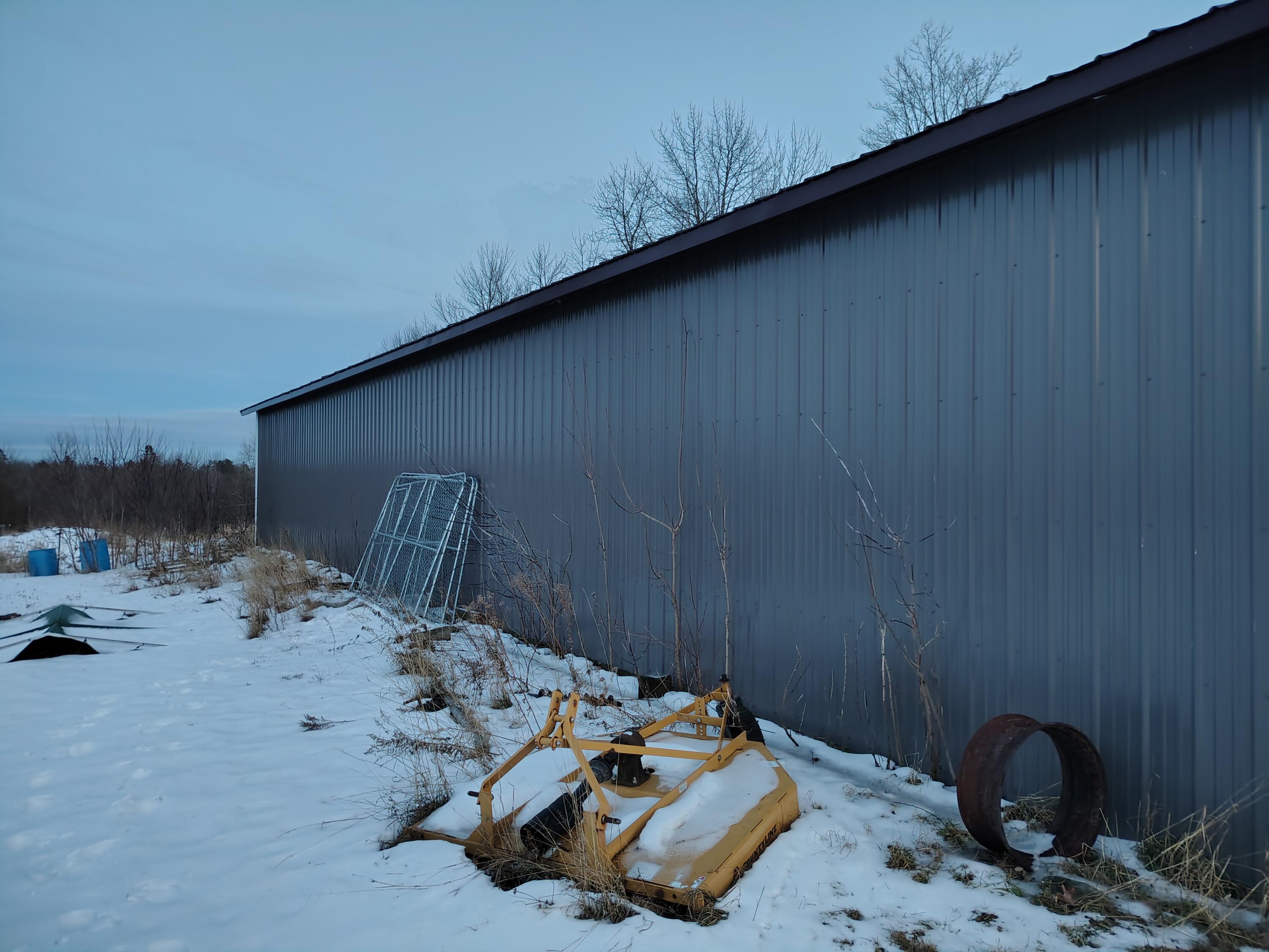 586 Upper-Charleston Road Charleston, ME 04422 - Photo 51 of 64 80x30 Pole Barn backside