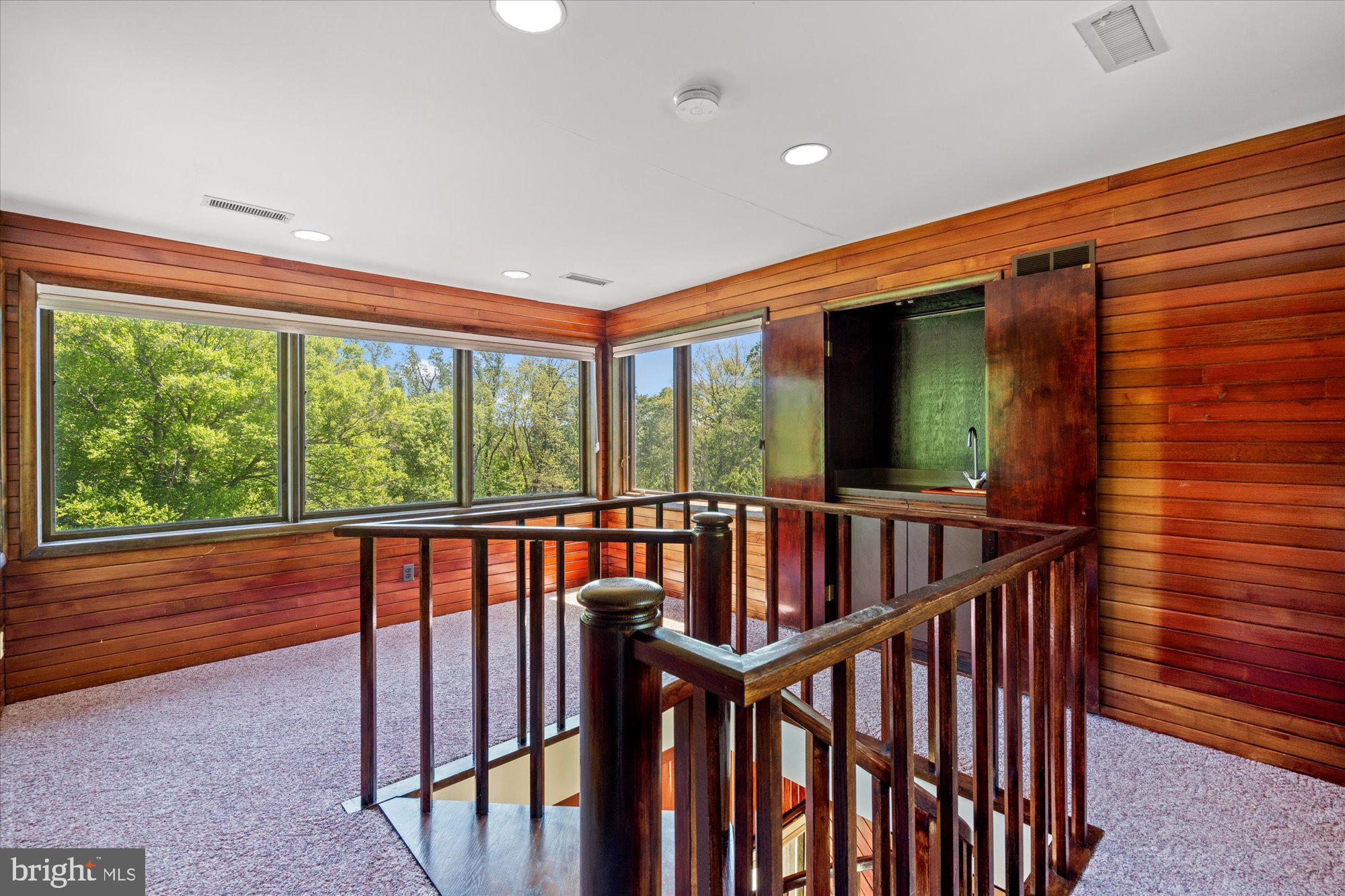 7211 Brickyard Road Potomac, MD 20854 - Photo 18 of 46 a view of hallway with furniture and stairs