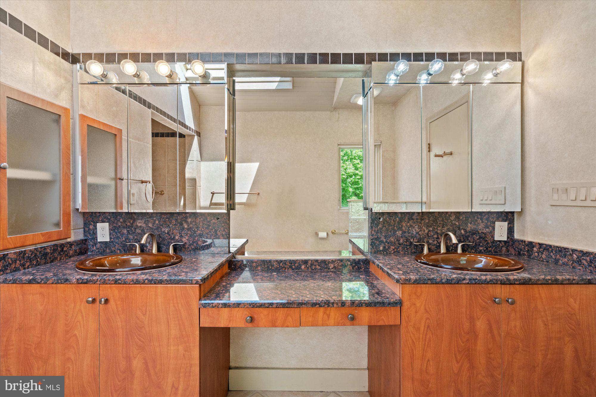 7211 Brickyard Road Potomac, MD 20854 - Photo 23 of 46 a kitchen with a sink and cabinets