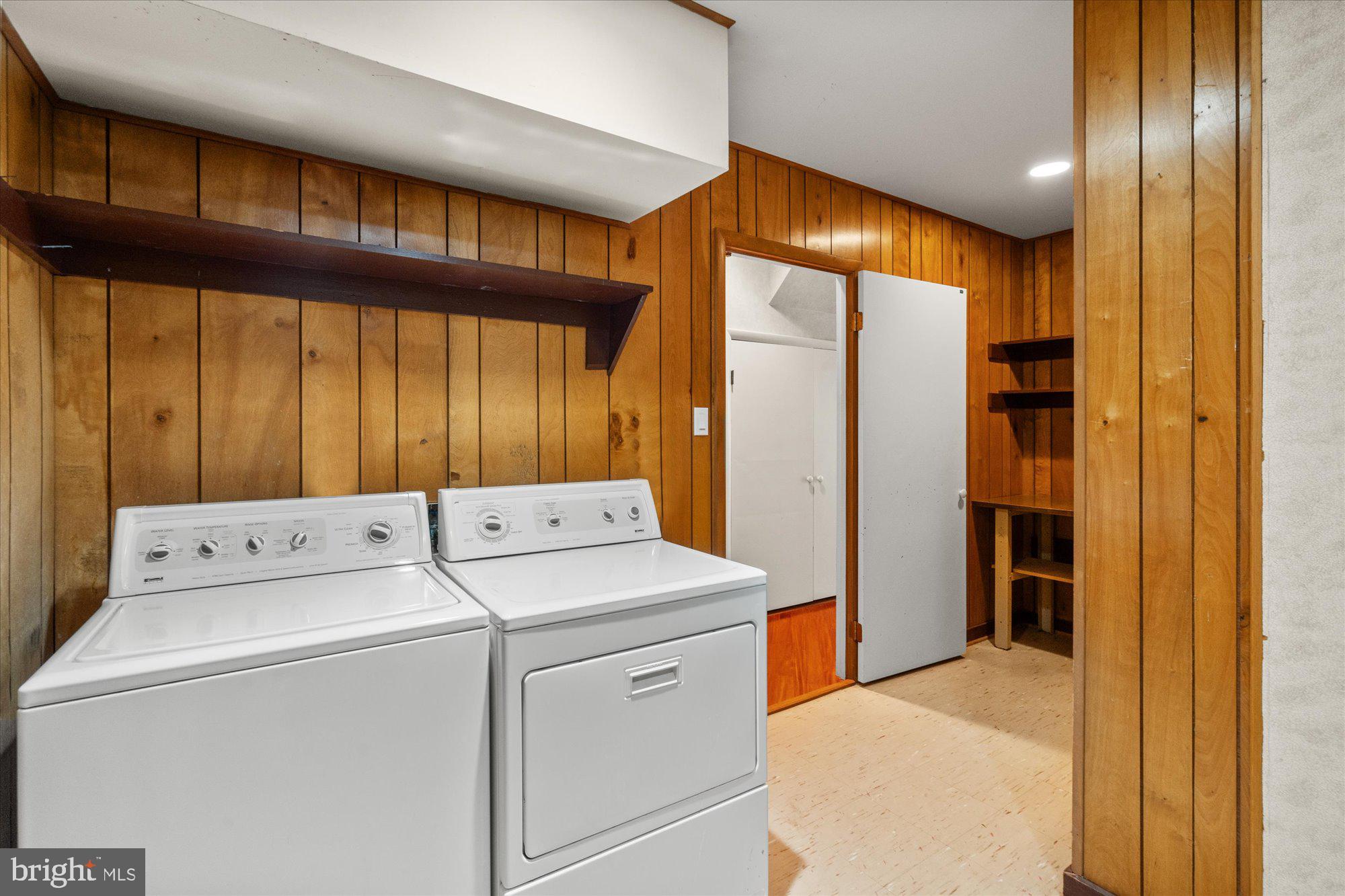 7211 Brickyard Road Potomac, MD 20854 - Photo 43 of 46 a view of storage and utility room with washer and dryer