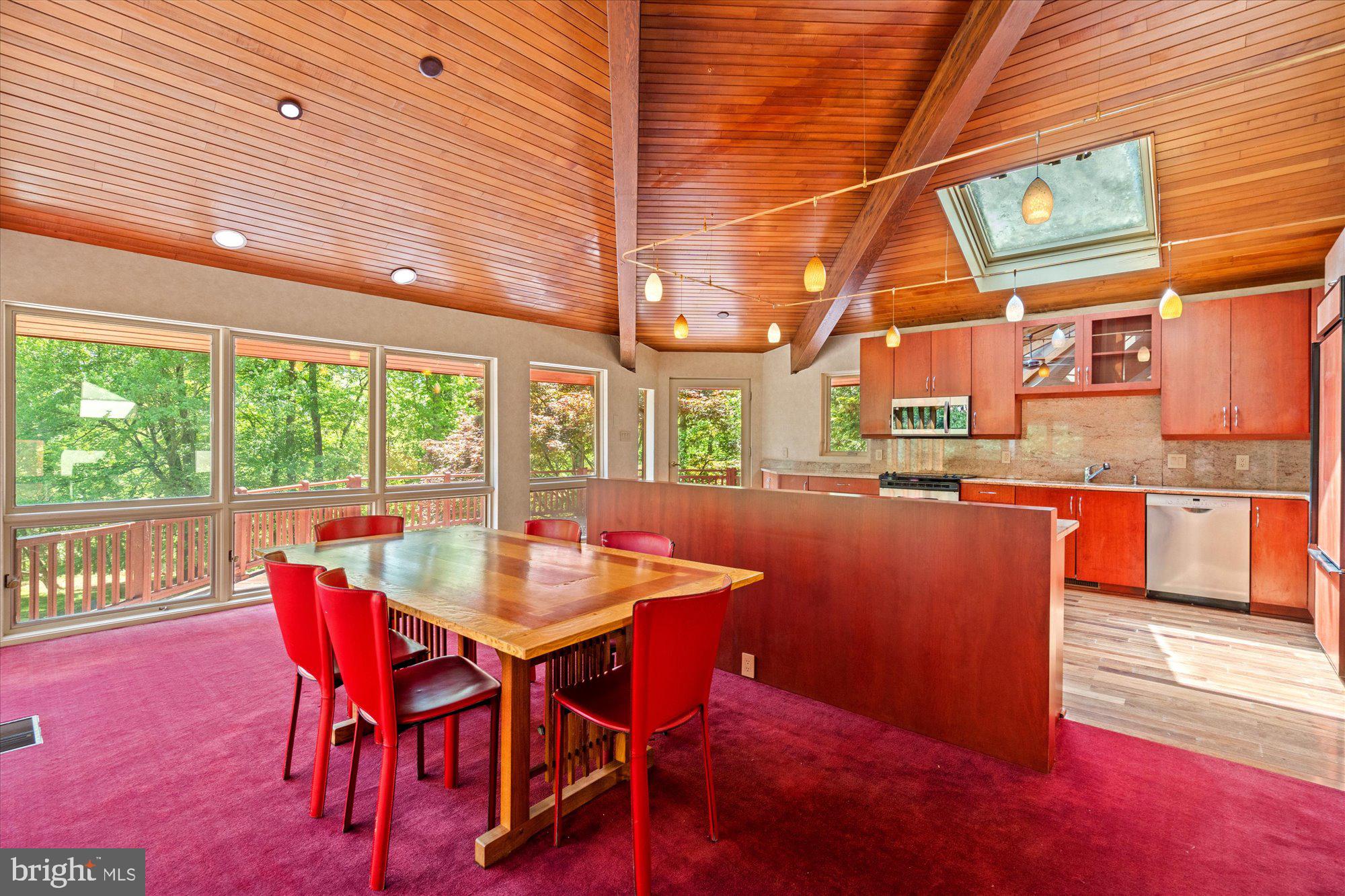 7211 Brickyard Road Potomac, MD 20854 - Photo 6 of 46 a dining room with furniture and a floor to ceiling window