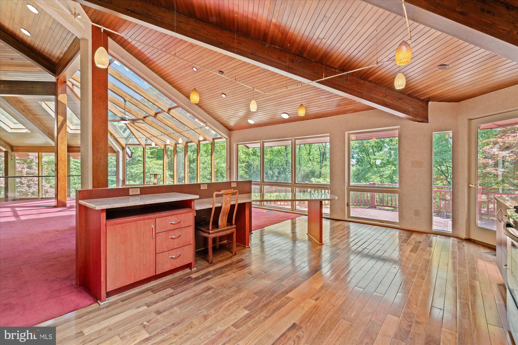 7211 Brickyard Road Potomac, MD 20854 - Photo 8 of 46 a room with wooden floors and furniture
