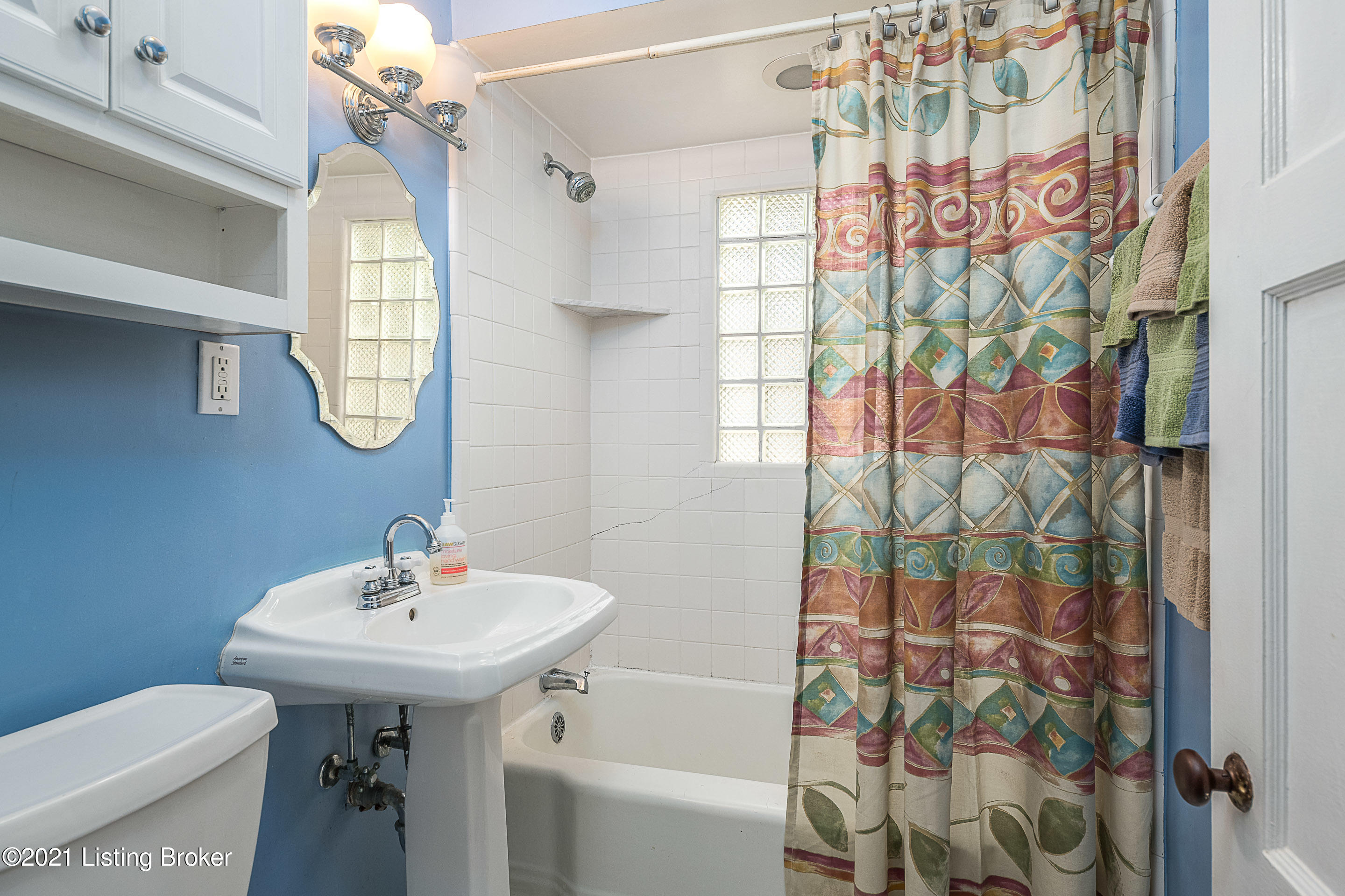 2500 Sherry Road Louisville, KY 40217 - Photo 19 of 28 THE BATHROOM HAS BEEN UPDATED & HAS A GLASS BLOCK WINDOW IN THE TUB/SURROUND AREA.